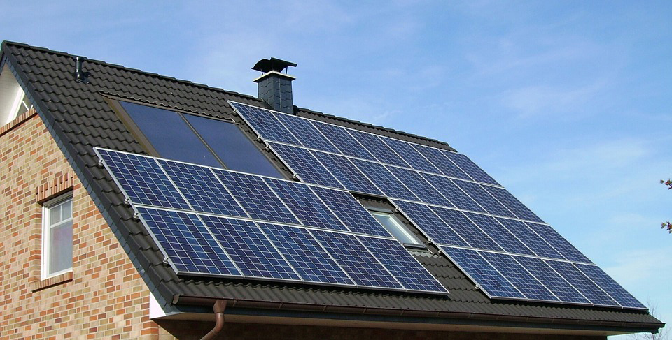 Valley Solar Pros installers mounting solar panels on a Visalia California home